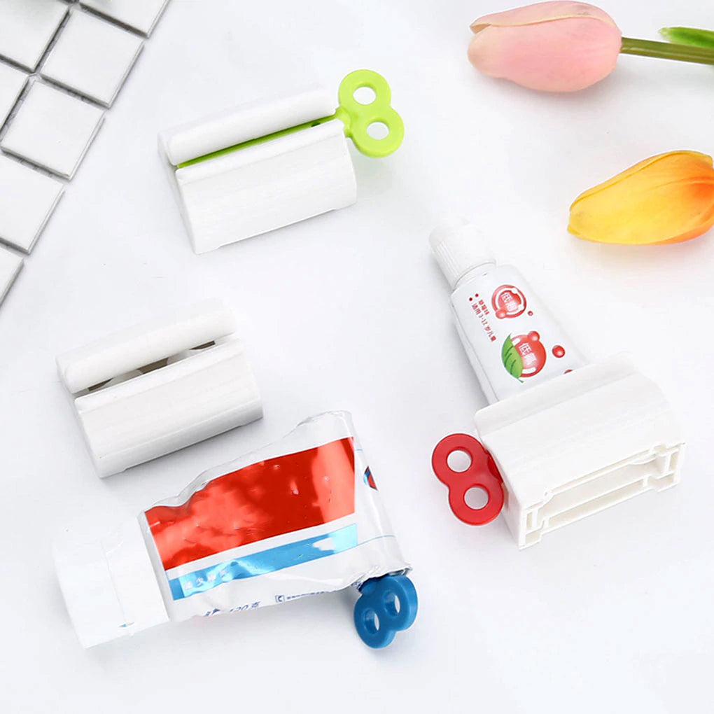 Pack of 4 Plastic Rotary Toothpaste Squeezer Device - Durable Rolling Tube Paste Squeezer & Dispenser - Manual Rotary Paste Holder